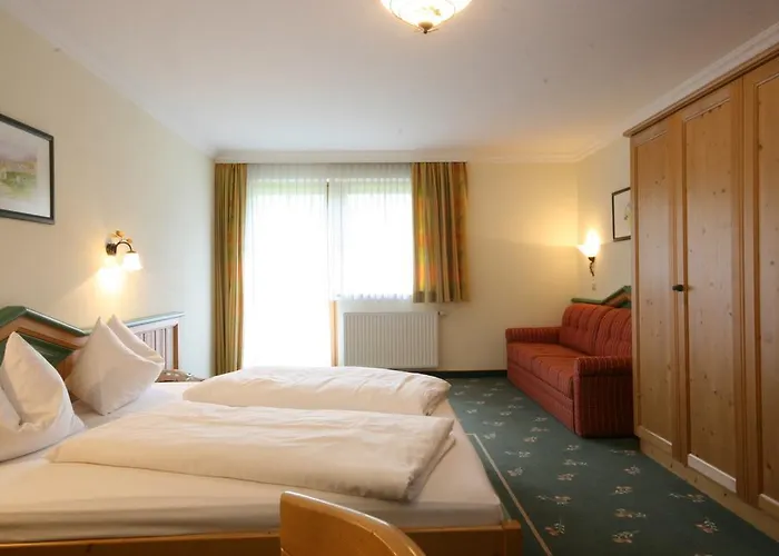 فندق Alpenhotel Neuwirt 4*